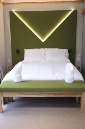 Postel nebo postele na pokoji v ubytování Evia Life Resort
