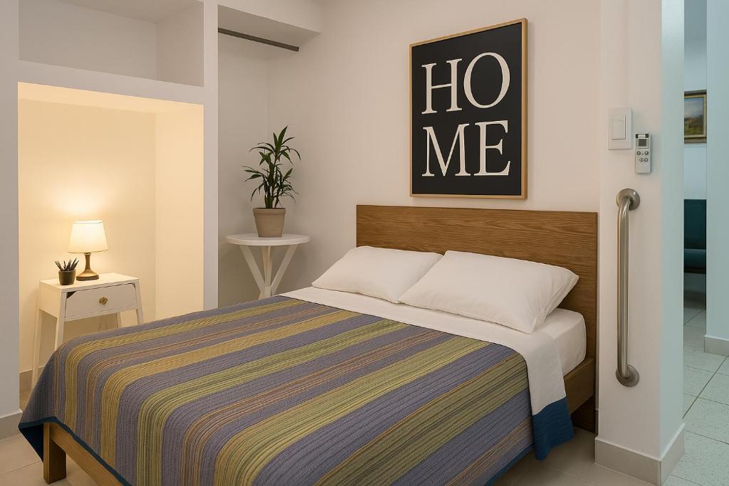 Postel nebo postele na pokoji v ubytování Tocumen Airport Los Corcho Suites