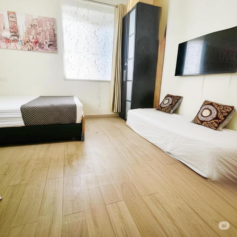 Postel nebo postele na pokoji v ubytování bugrashov 13 room
