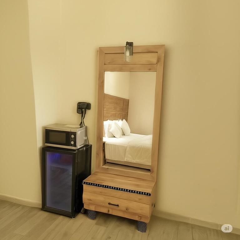 Postel nebo postele na pokoji v ubytování bugrashov 13 room