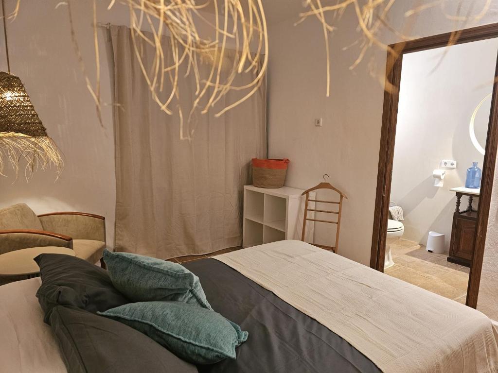Postel nebo postele na pokoji v ubytování Agroturismo Finca Can Sec