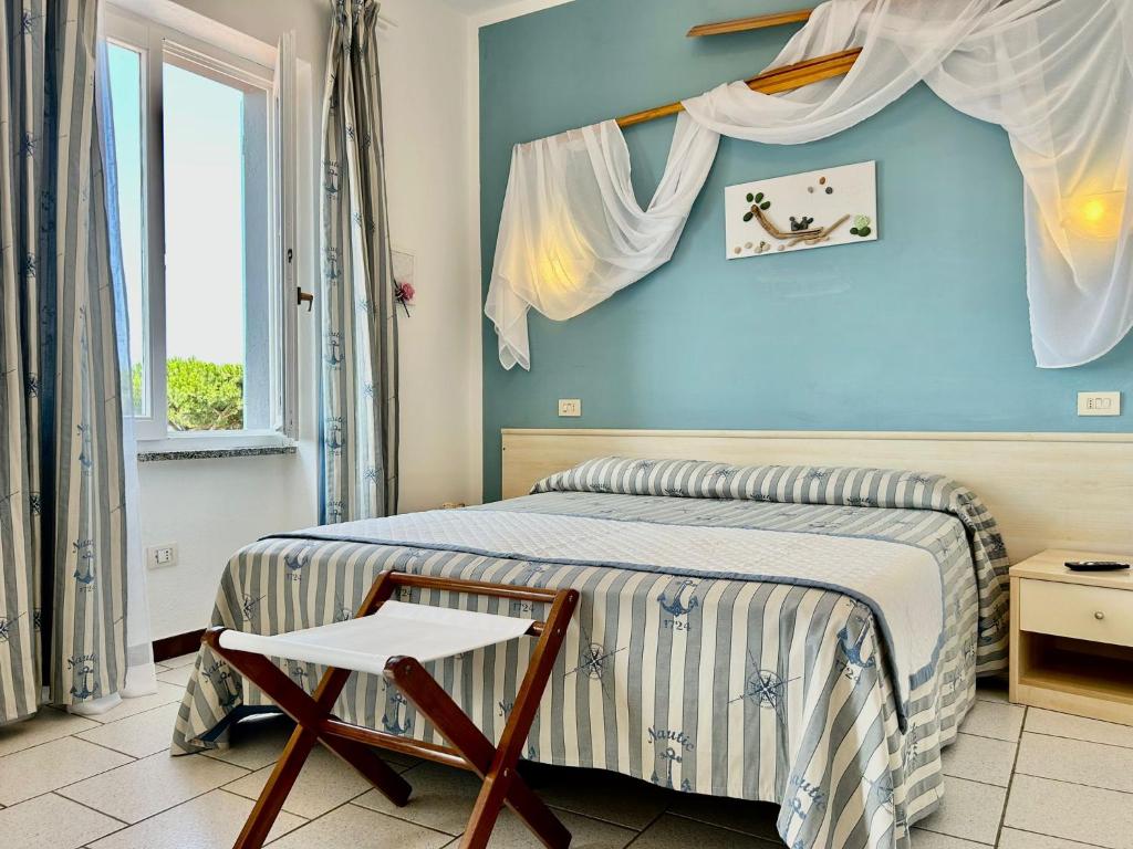 Postel nebo postele na pokoji v ubytování Hotel Sant'Andrea