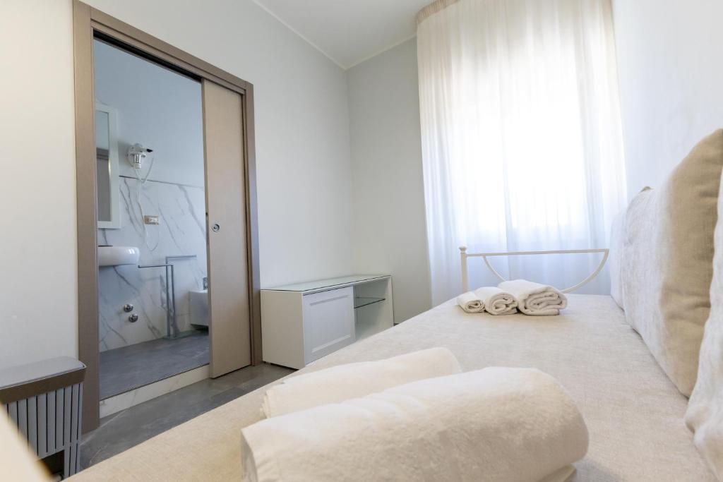 Postel nebo postele na pokoji v ubytování Bed and Breakfast Arcobaleno