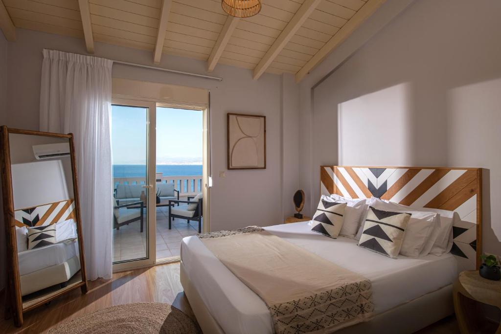 Postel nebo postele na pokoji v ubytování Indigo Sunrise Villas
