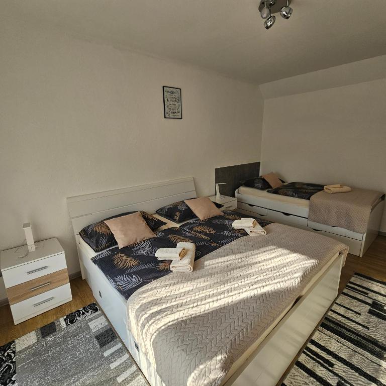 Posteľ alebo postele v izbe v ubytovaní Apartment Topalović