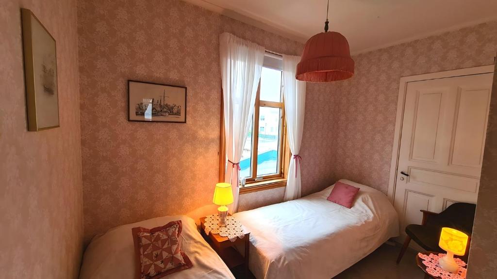 Postel nebo postele na pokoji v ubytování Space to enjoy - 2BR Apt Smögen