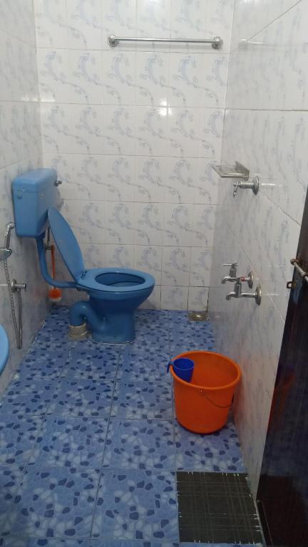 Koupelna v ubytování Thekkekara Tourist Home Vagamon