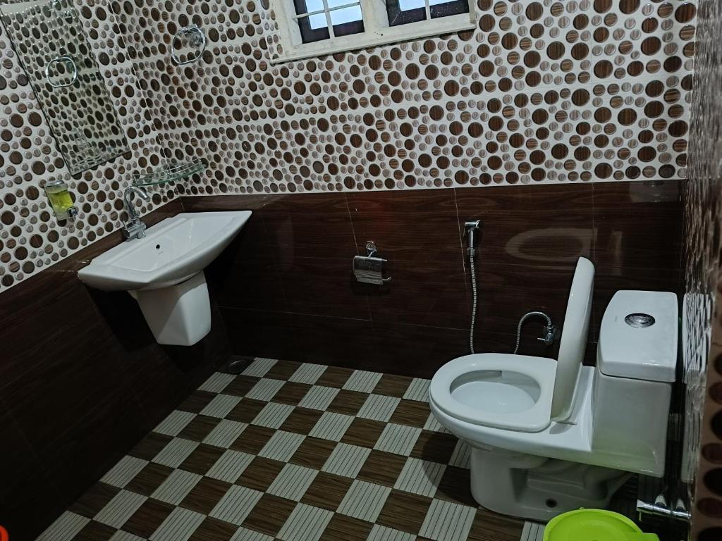 Koupelna v ubytování Thekkekara Tourist Home Vagamon