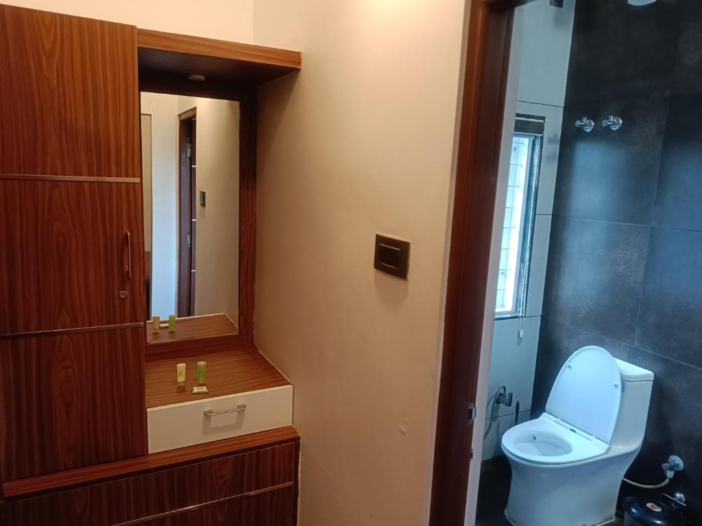 Koupelna v ubytování Thekkekara Tourist Home Vagamon