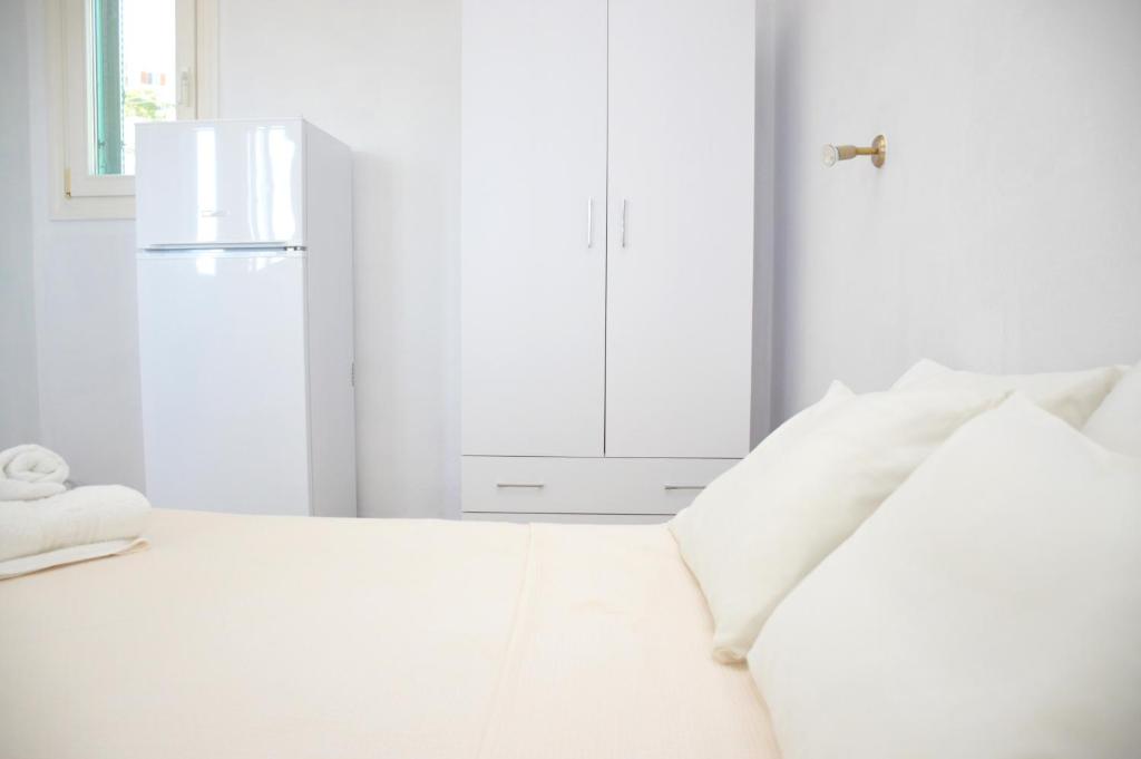 Postel nebo postele na pokoji v ubytování Melide