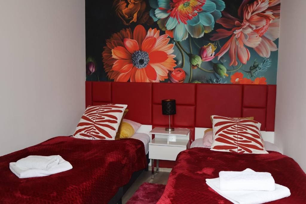 Postel nebo postele na pokoji v ubytování Le Rose Suites & Park Hotel