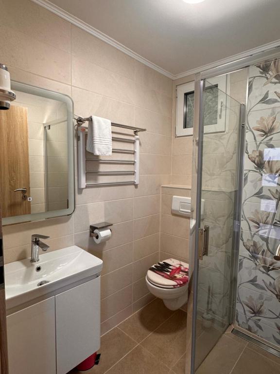 Koupelna v ubytování Le Rose Suites & Park Hotel