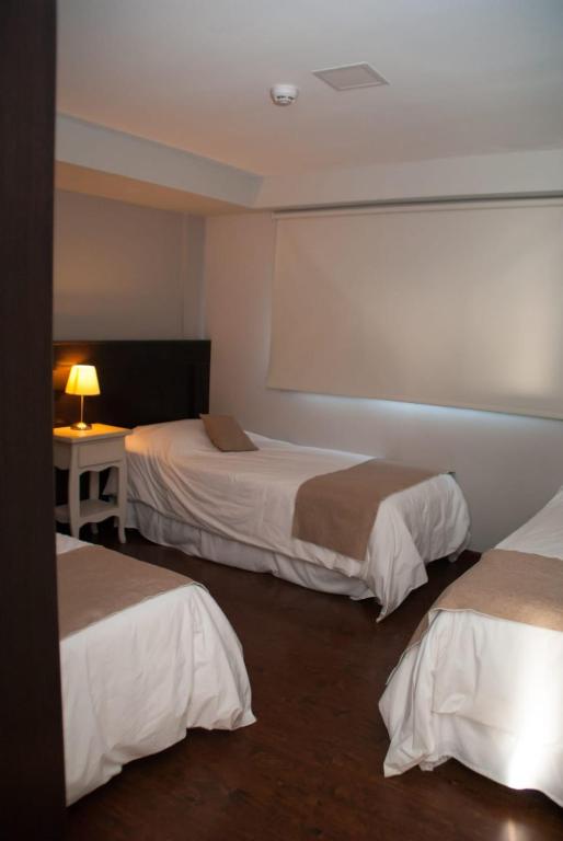 Postel nebo postele na pokoji v ubytování Links Apart Hotel