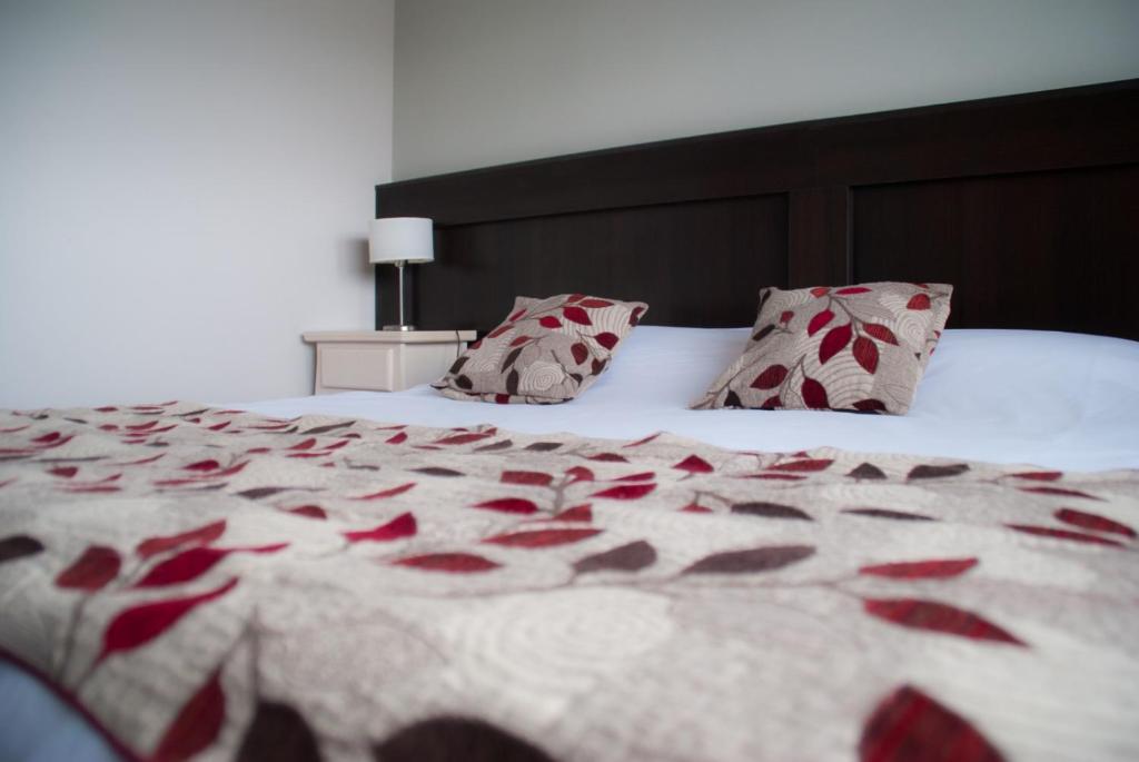Postel nebo postele na pokoji v ubytování Links Apart Hotel