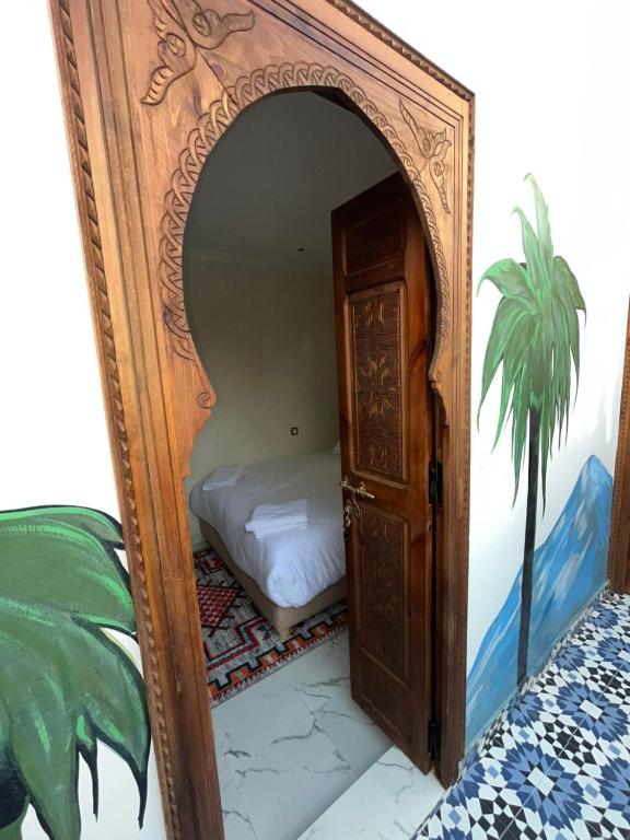 Postel nebo postele na pokoji v ubytování Riad Abrare