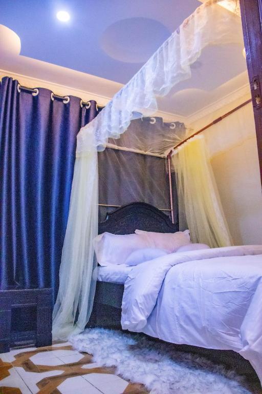 Postel nebo postele na pokoji v ubytování Wiga Nest Homes Narok