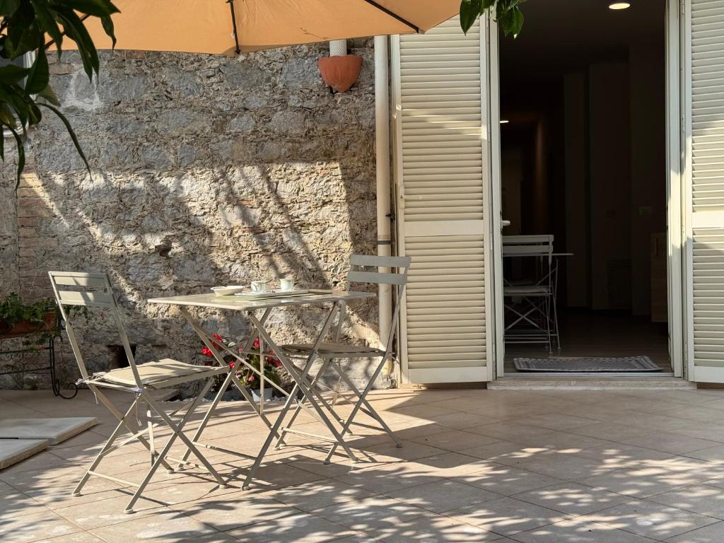 Patio nebo venkovní prostory v ubytování Cassandra Rooms