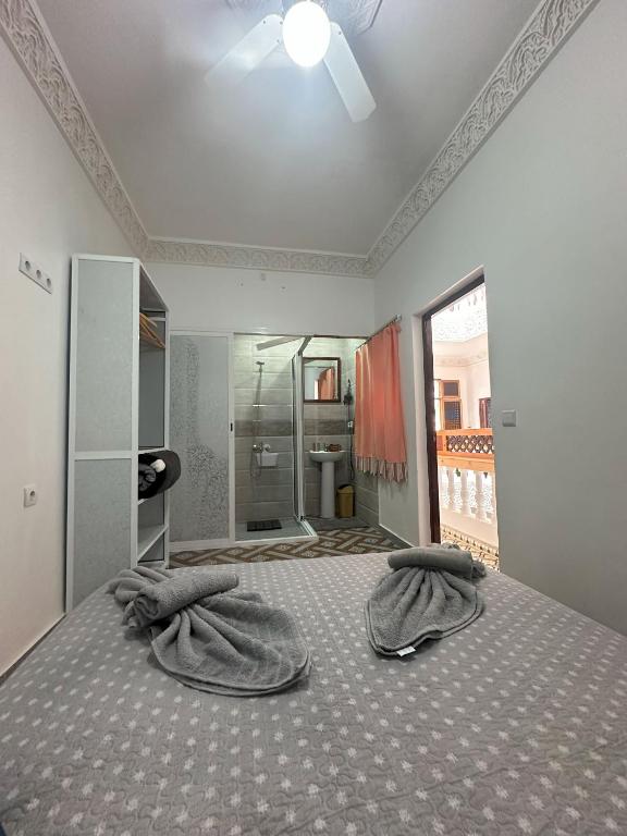 Llit o llits en una habitació de Riad Larache