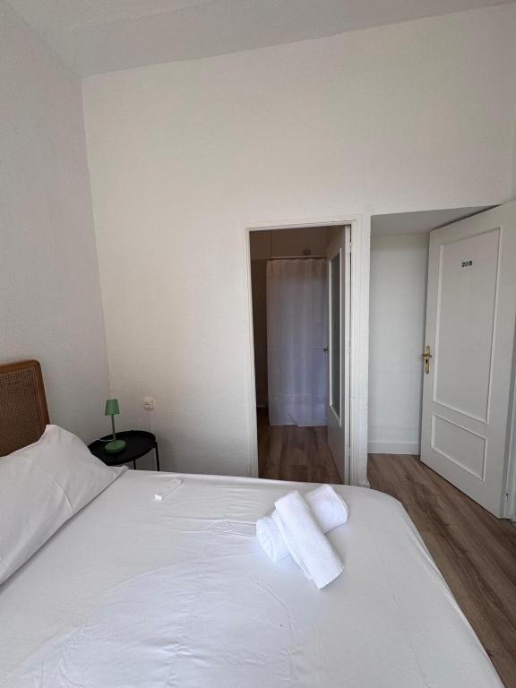 Postel nebo postele na pokoji v ubytování Calma House Rooms
