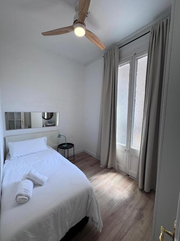 Postel nebo postele na pokoji v ubytování Calma House Rooms