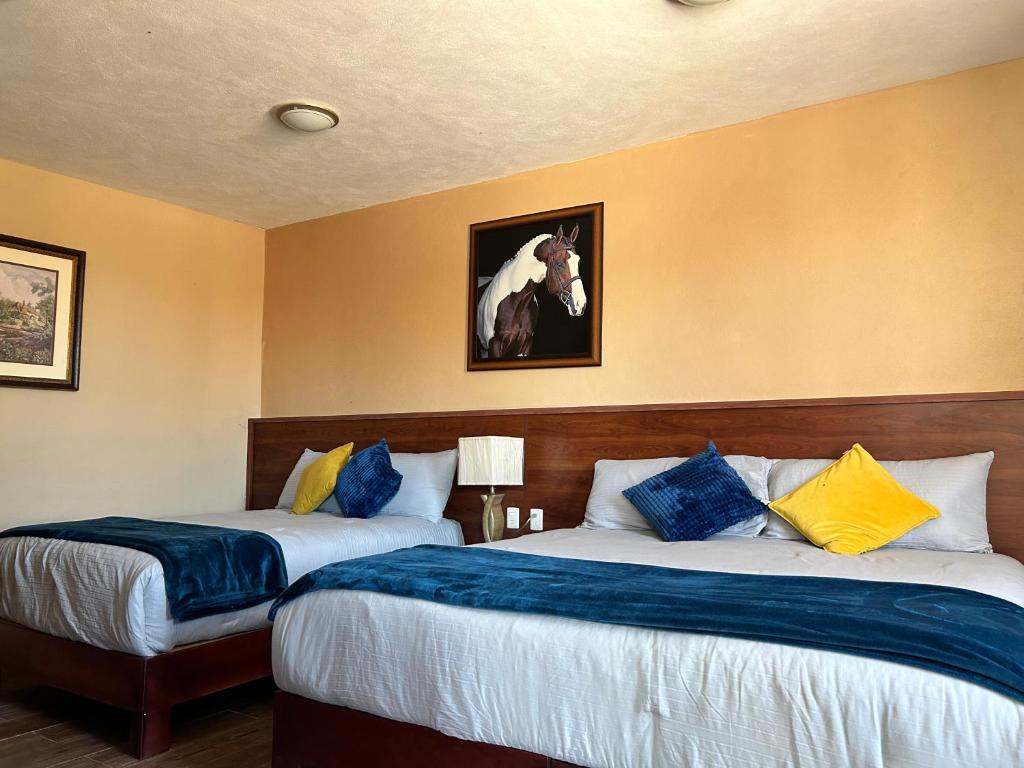 Ένα ή περισσότερα κρεβάτια σε δωμάτιο στο Rancho los Encinos