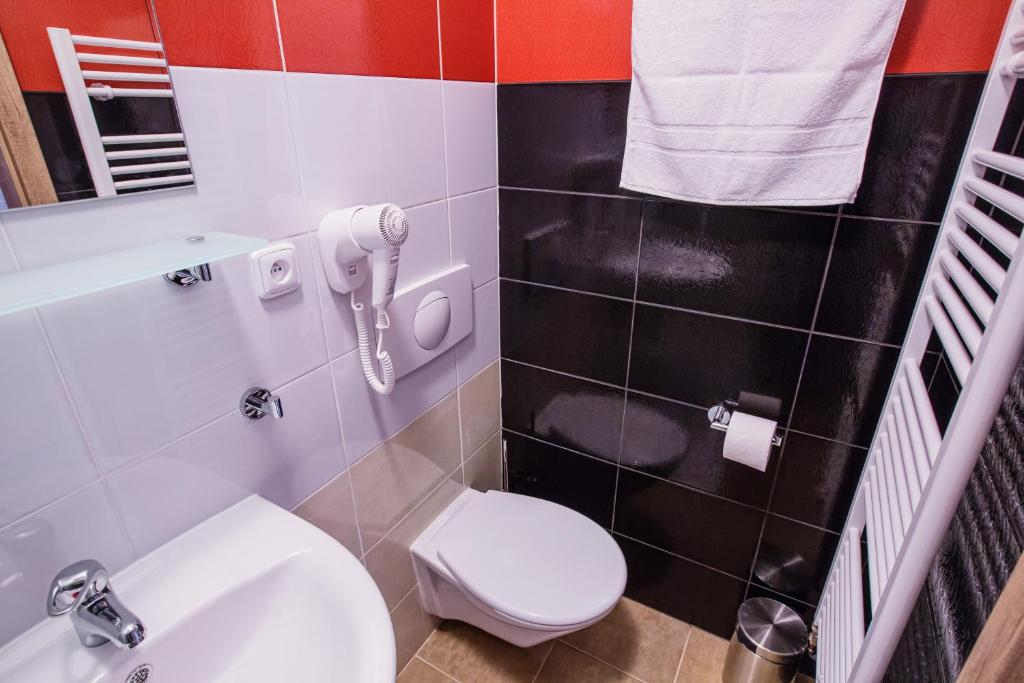 Koupelna v ubytování Hotel Na Šustně