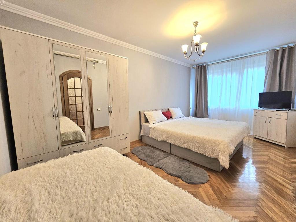 Llit o llits en una habitació de Bulevardul Dacia 18