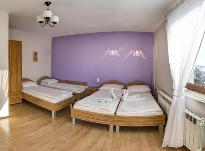 Posteľ alebo postele v izbe v ubytovaní willapieninska