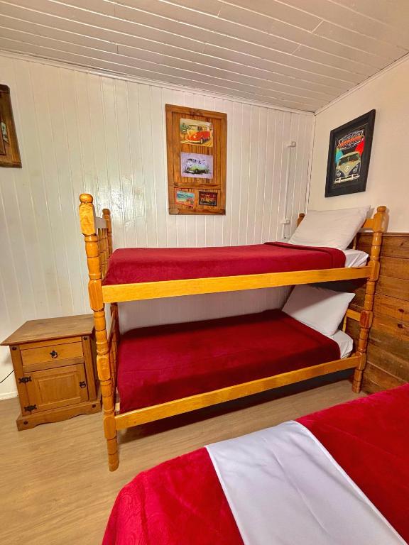Postel nebo postele na pokoji v ubytování Casa do Rogério Hostel