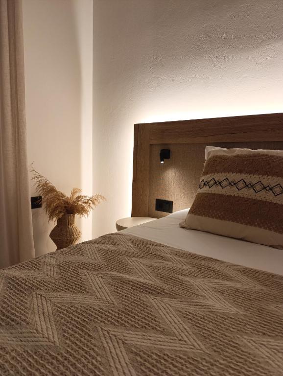Postel nebo postele na pokoji v ubytování Plakourakia