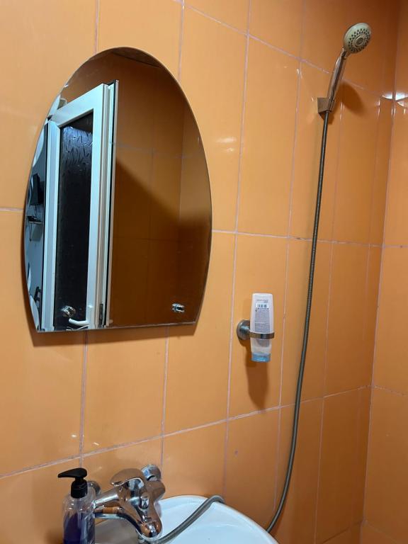 Koupelna v ubytování GM Hotel