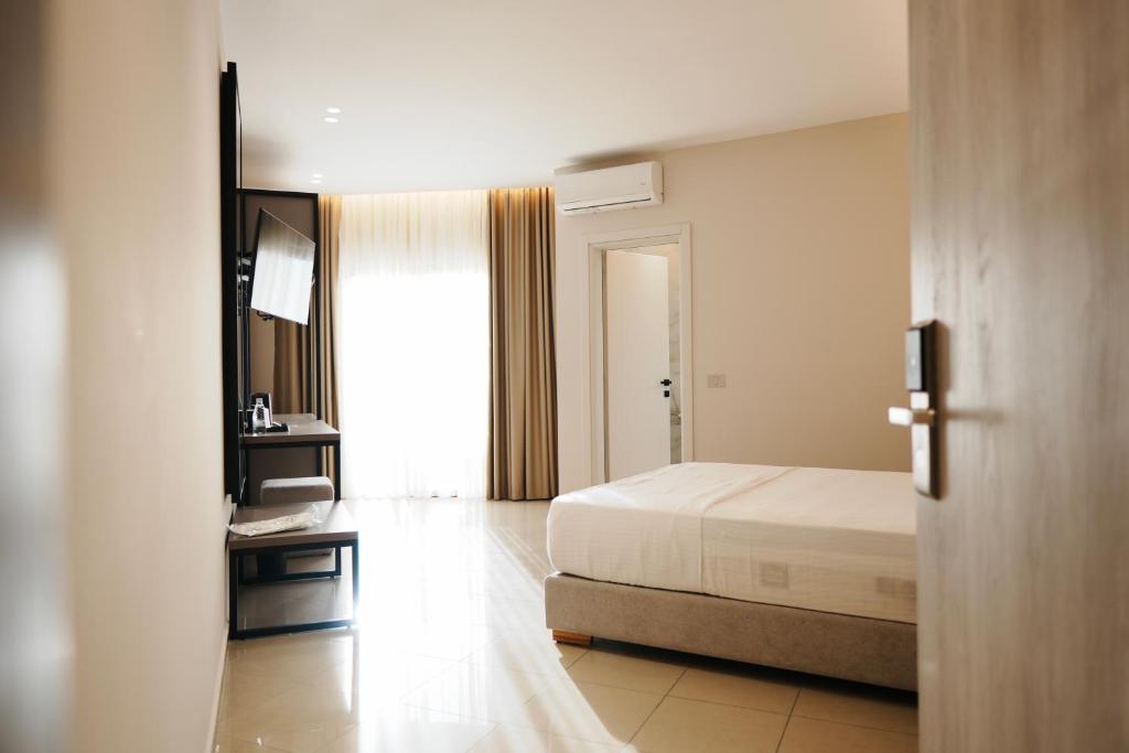 Postel nebo postele na pokoji v ubytování Hotel Mediterrane