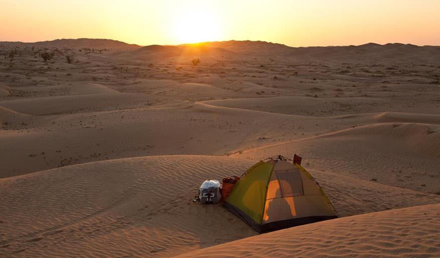 Východ nebo západ slunce při pohledu z luxury tent nebo okolí