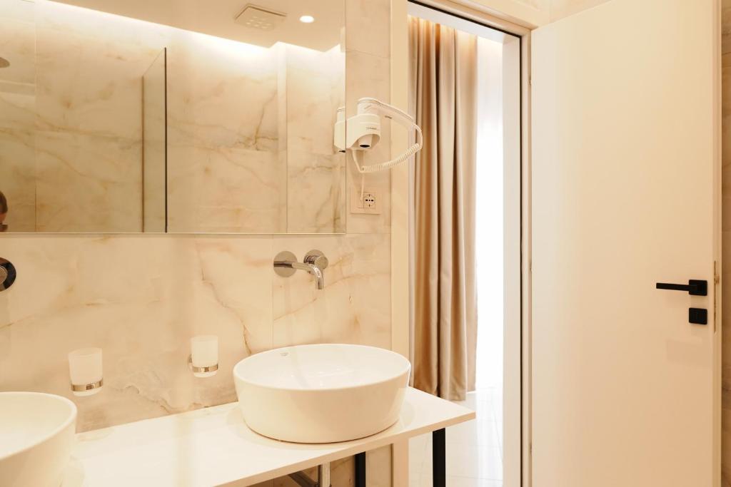 Koupelna v ubytování Hotel Mediterrane