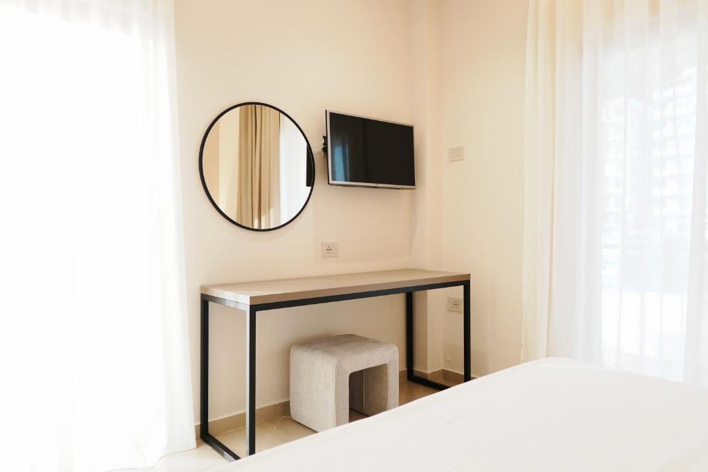 TV a/nebo společenská místnost v ubytování Hotel Mediterrane
