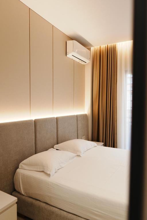 Postel nebo postele na pokoji v ubytování Hotel Mediterrane