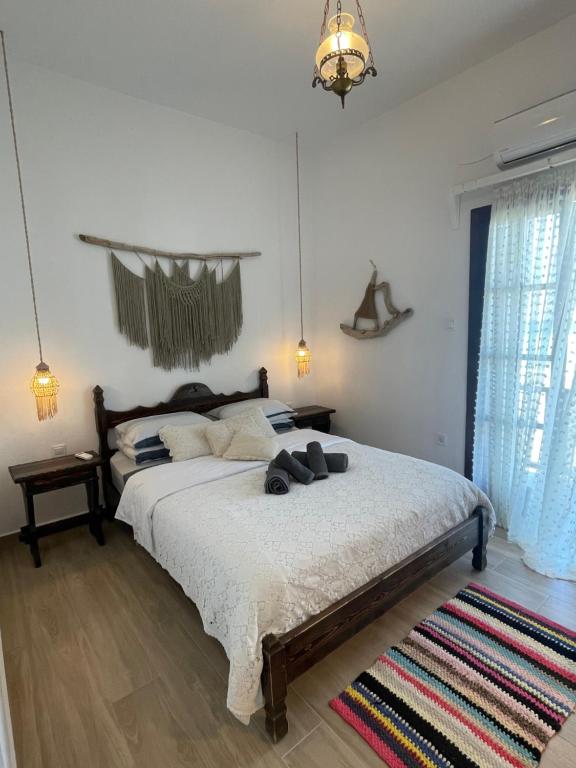 Posteľ alebo postele v izbe v ubytovaní Dovas house