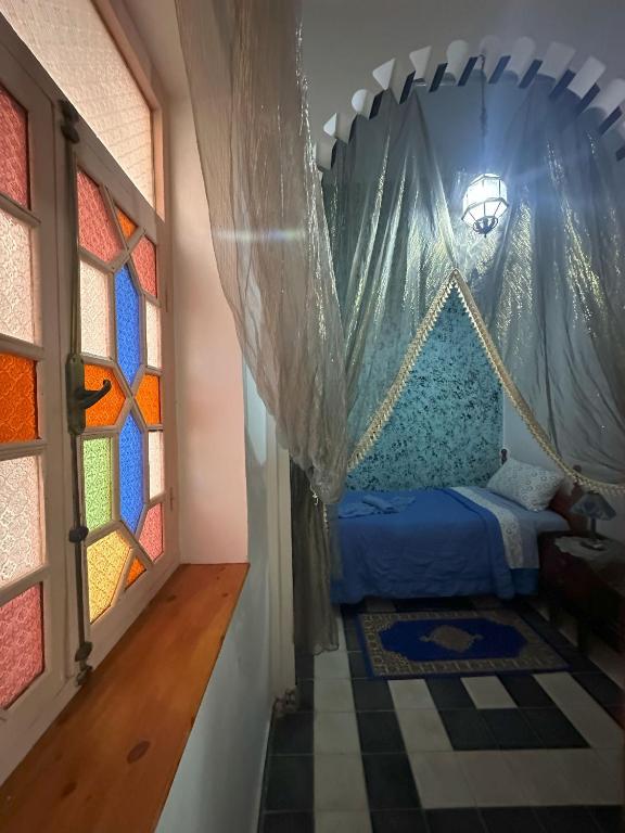 Llit o llits en una habitació de Riad Larache