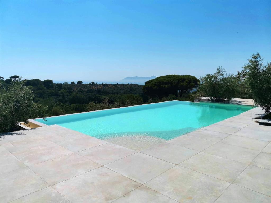 an image of a swimming pool in a house at Villa Giove 1 in Terracina