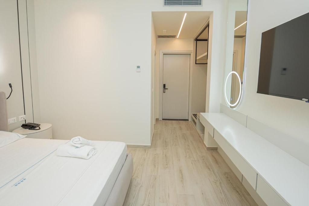 Postel nebo postele na pokoji v ubytování Laid Hotel