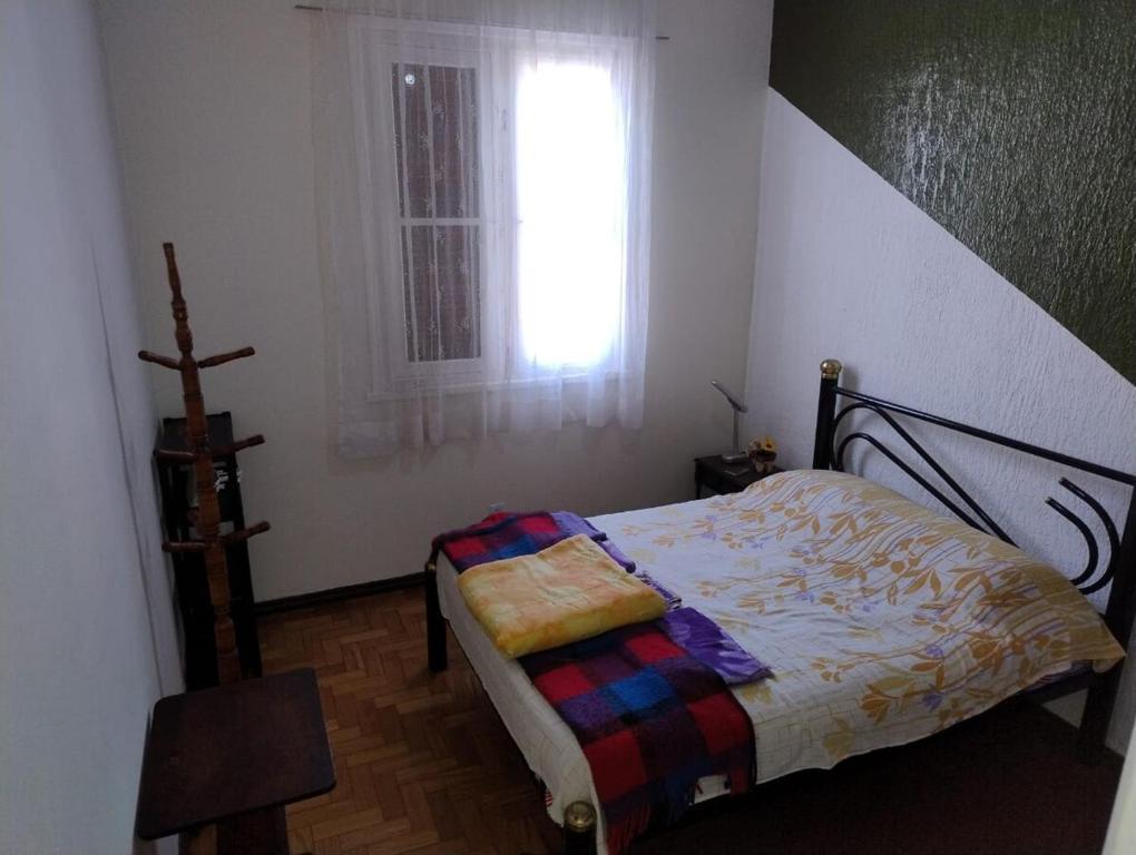 Postel nebo postele na pokoji v ubytování Apartamento no Centro Histórico