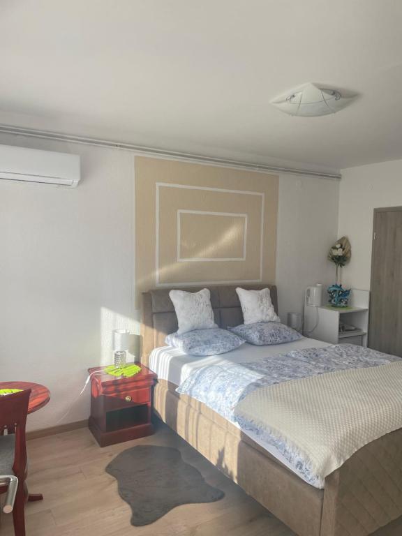 Postel nebo postele na pokoji v ubytování Ana Rooms Bled