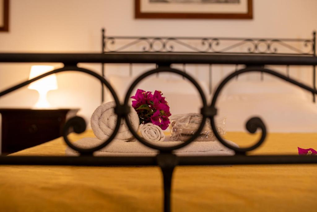 Postel nebo postele na pokoji v ubytování Agriturismo La Stornara