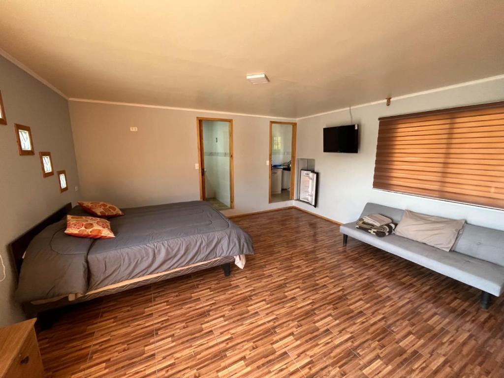 Postel nebo postele na pokoji v ubytování Agro Camping Los Costeños