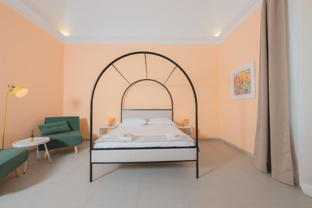 Postel nebo postele na pokoji v ubytování Aria Rooms