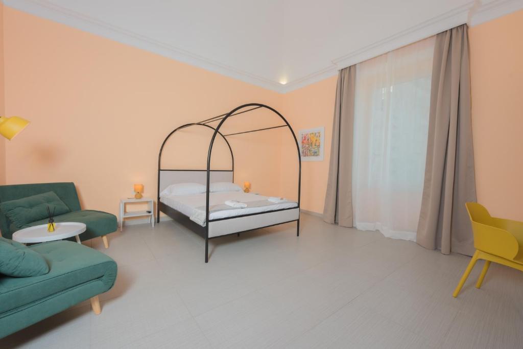 Postel nebo postele na pokoji v ubytování Aria Rooms