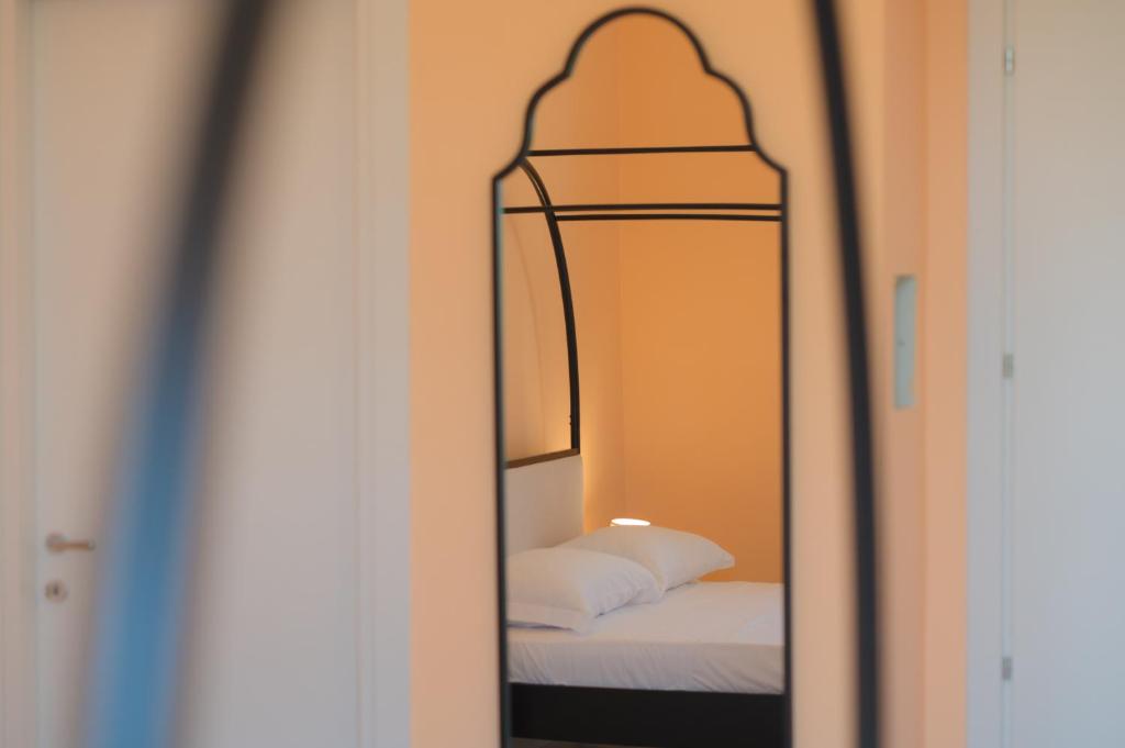 Postel nebo postele na pokoji v ubytování Aria Rooms