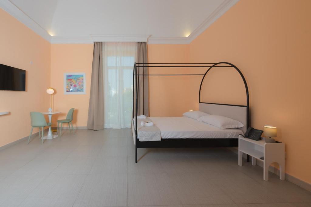 Postel nebo postele na pokoji v ubytování Aria Rooms