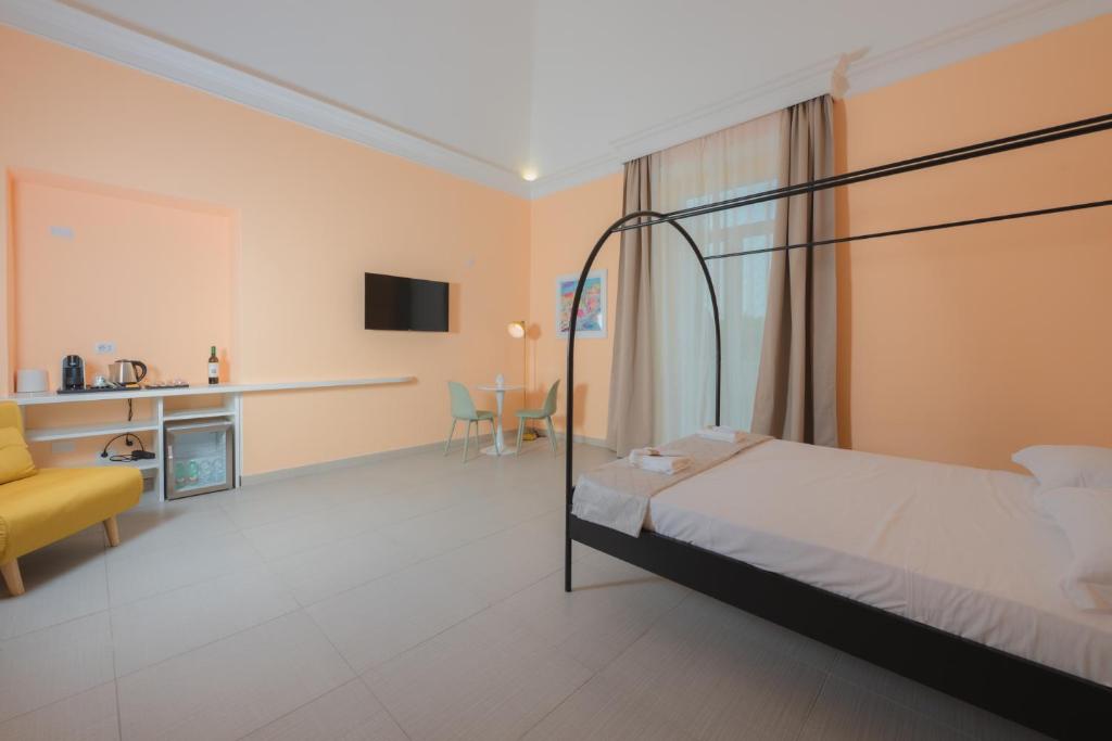 Postel nebo postele na pokoji v ubytování Aria Rooms