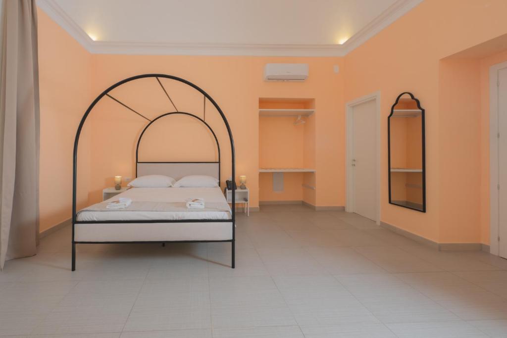 Postel nebo postele na pokoji v ubytování Aria Rooms